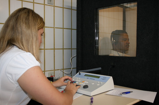 a person undergoing an auditory test