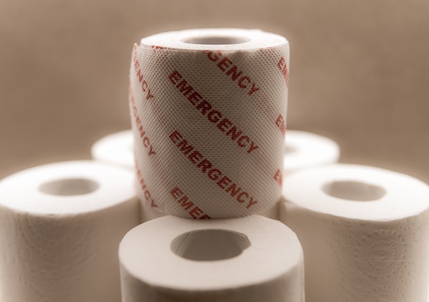 toilet paper with the word ‘emergency’ written on one roll
