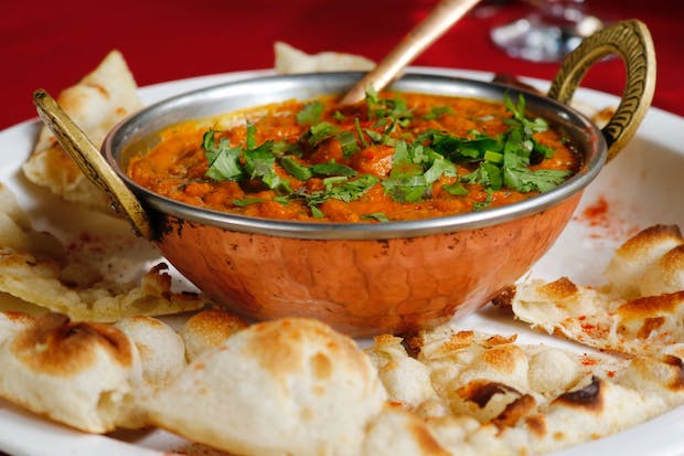 An Indian curry with naan bread